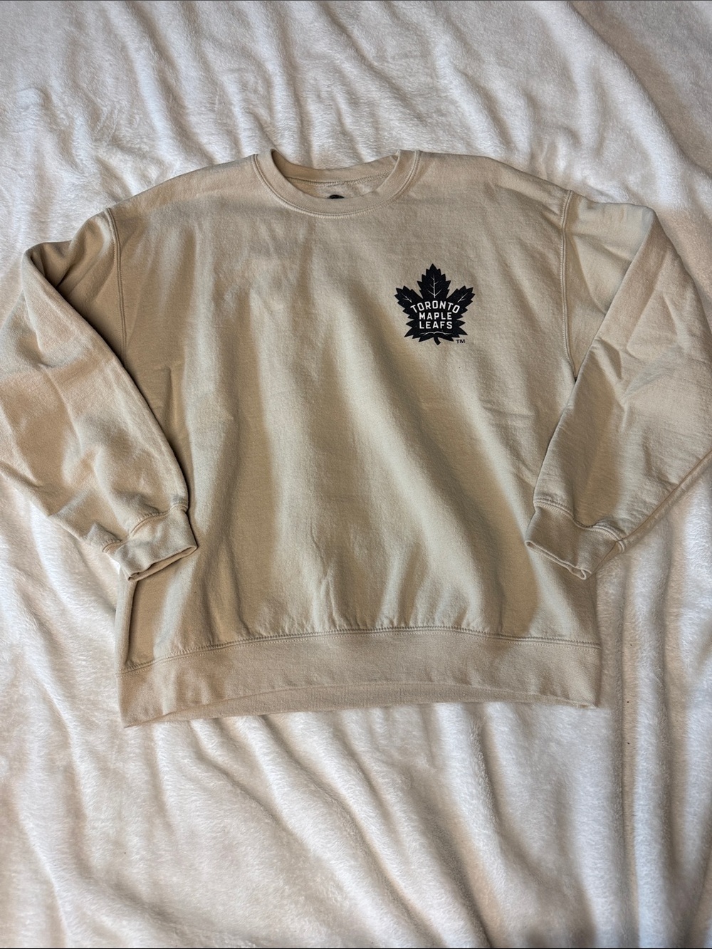 NHL Beige Crewneck Sweatshirt with Black Maple Leaf Logo
